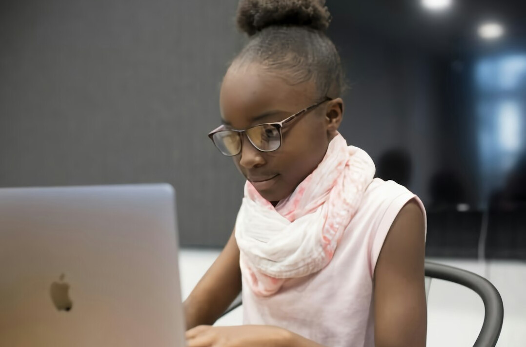kids coding on laptop