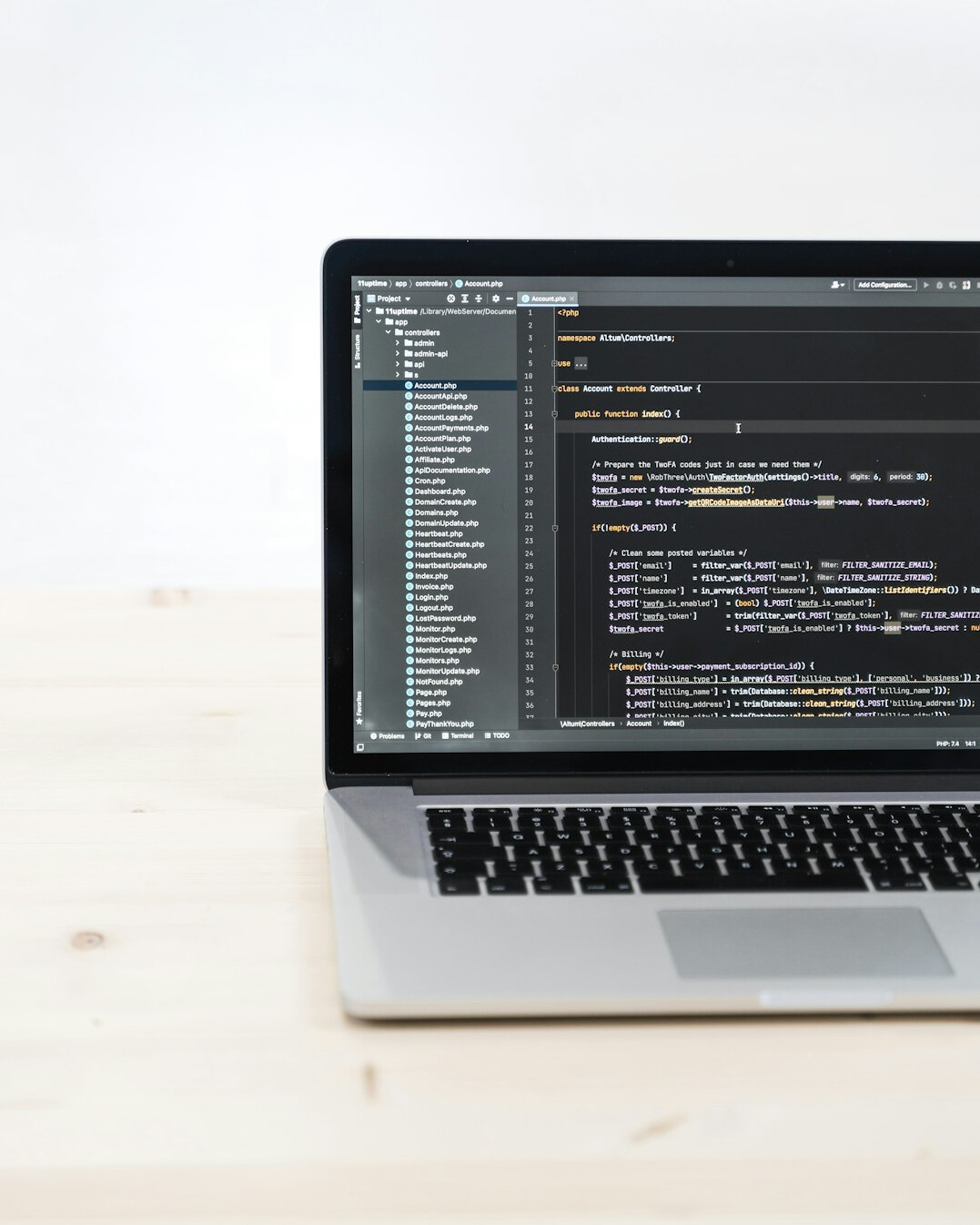 student learning code on laptop